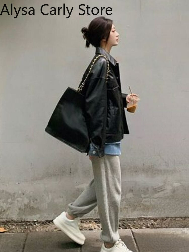 Rebel Chic: YRUOSLE Women's Punk Style Faux Leather Jacket